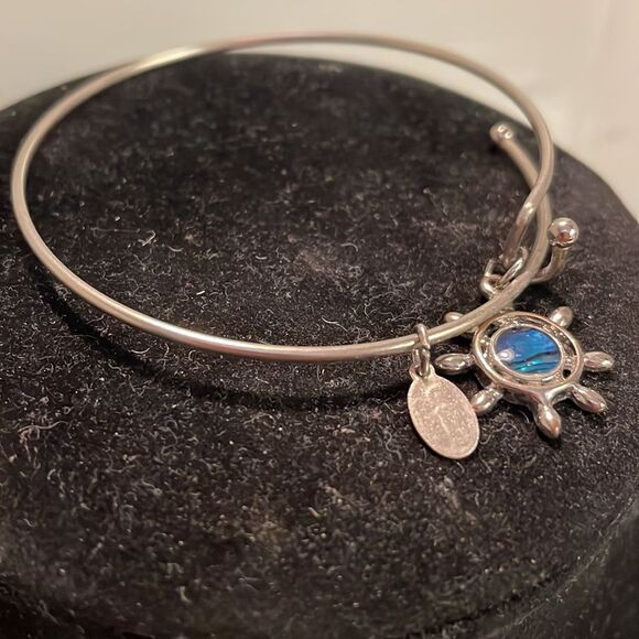 7.5” silver tone bangle bracelet with silver tone nautical charm - Picture 5 of 10